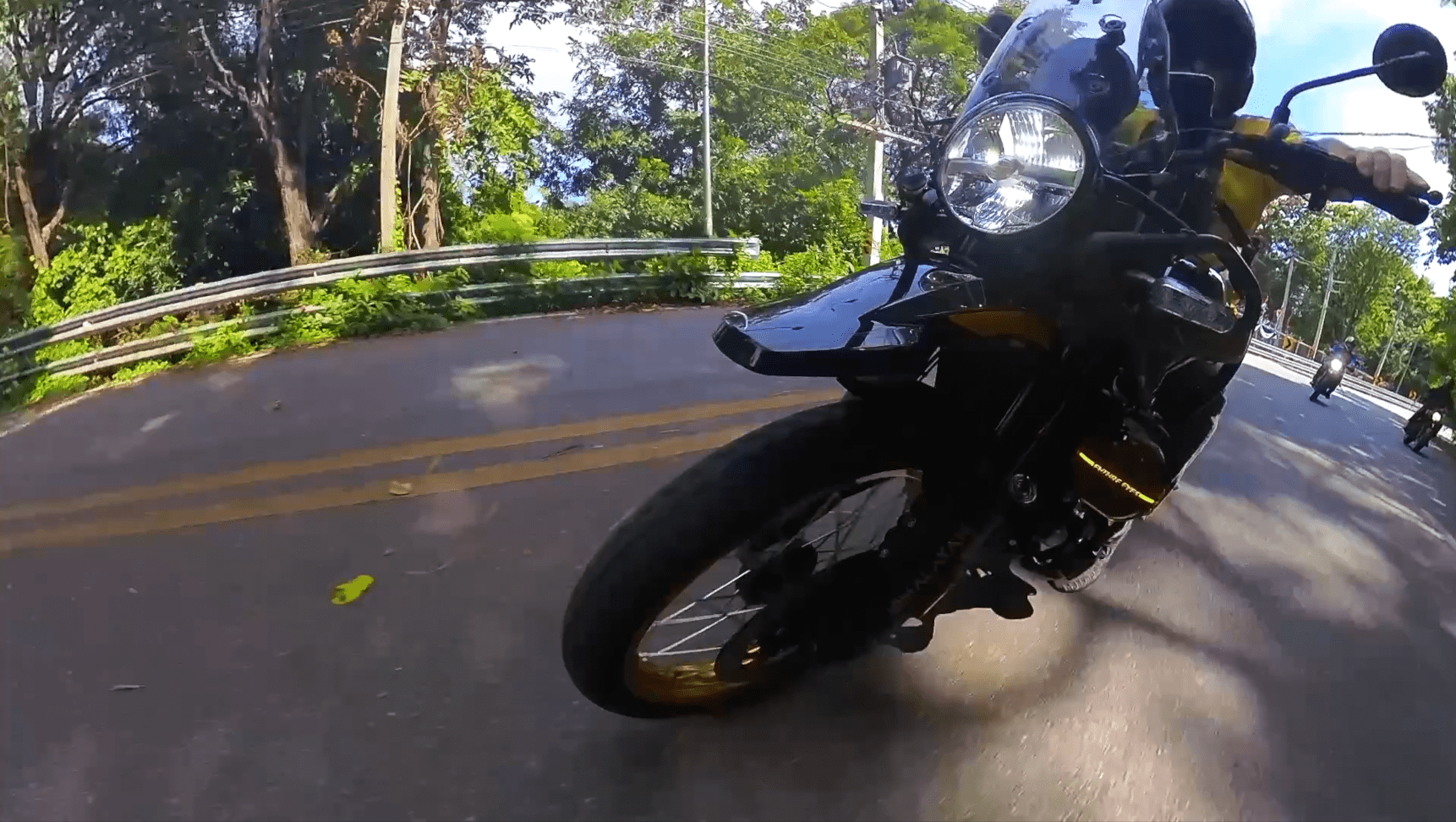 Motorcycle rider on mountain road